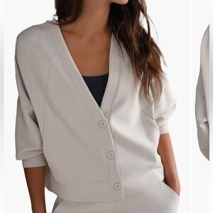 RHONE DreamGlow Cardigan in Sand. Size M.